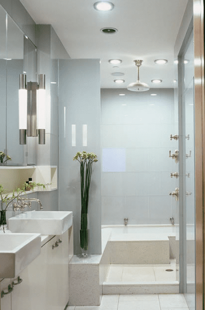 Luxurious bathroom renovation in Calgary showcasing custom cabinetry and designer tile